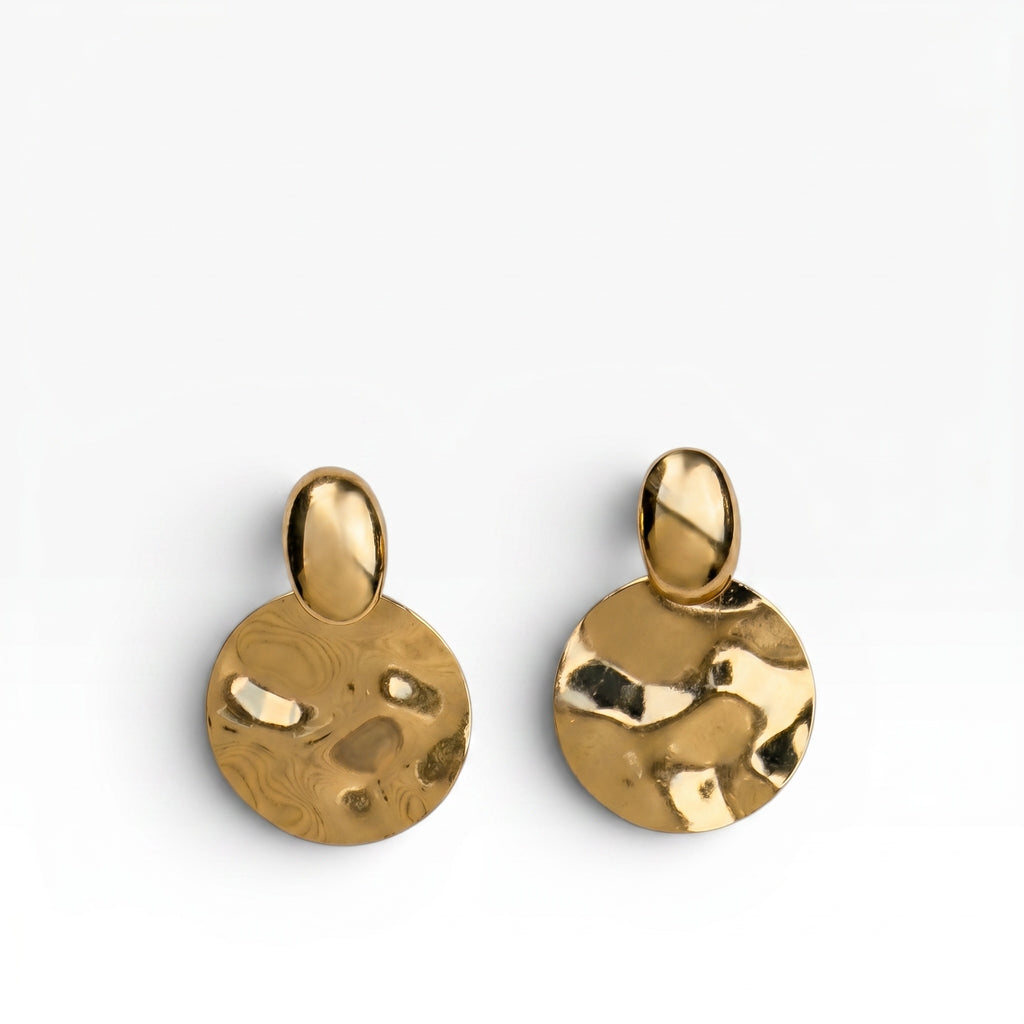 TALI gold-tone statement earrings featuring a smooth stud top and a large, hammered-texture circular drop.