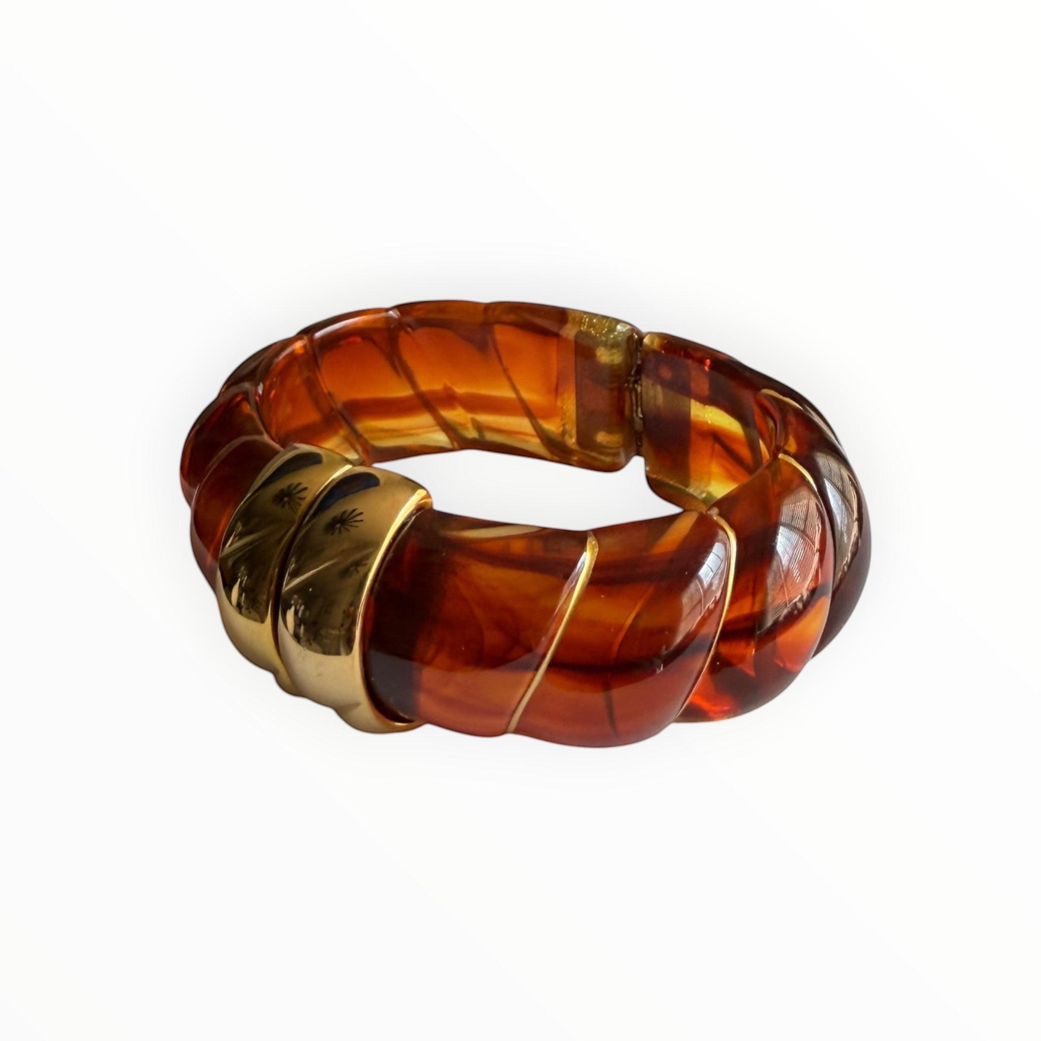 TALI The Riviera resin bracelet in amber with gold-plated accents and a textured, twisted design.