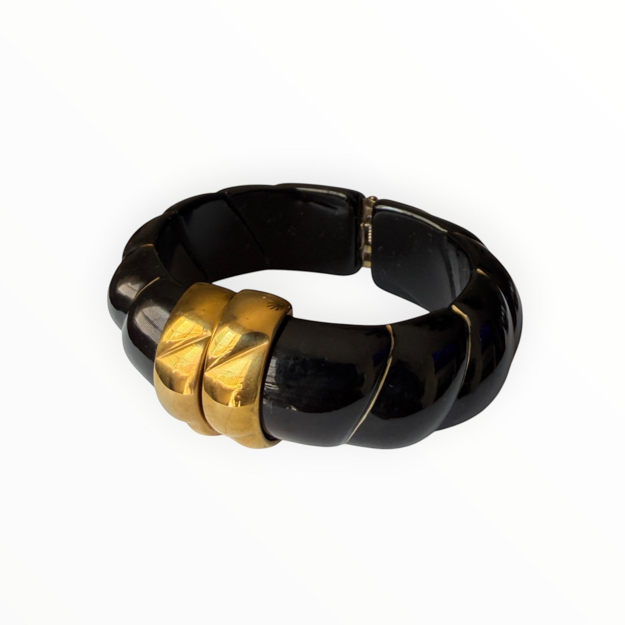 TALI The Riviera resin bracelet in black with gold-plated accents and a chunky ribbed design.