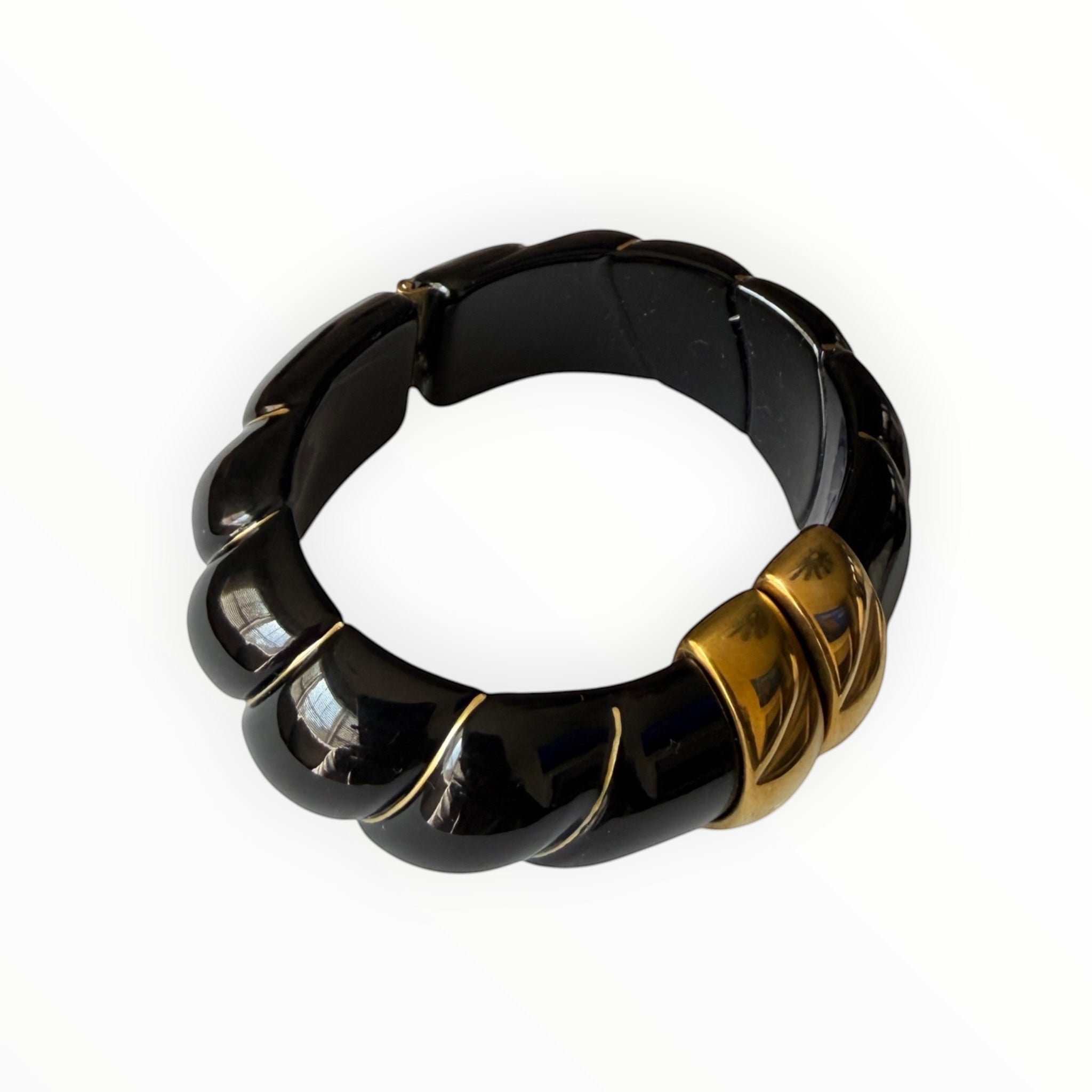 TALI The Riviera resin bracelet in black with gold-plated accents, featuring a chunky, segmented design.