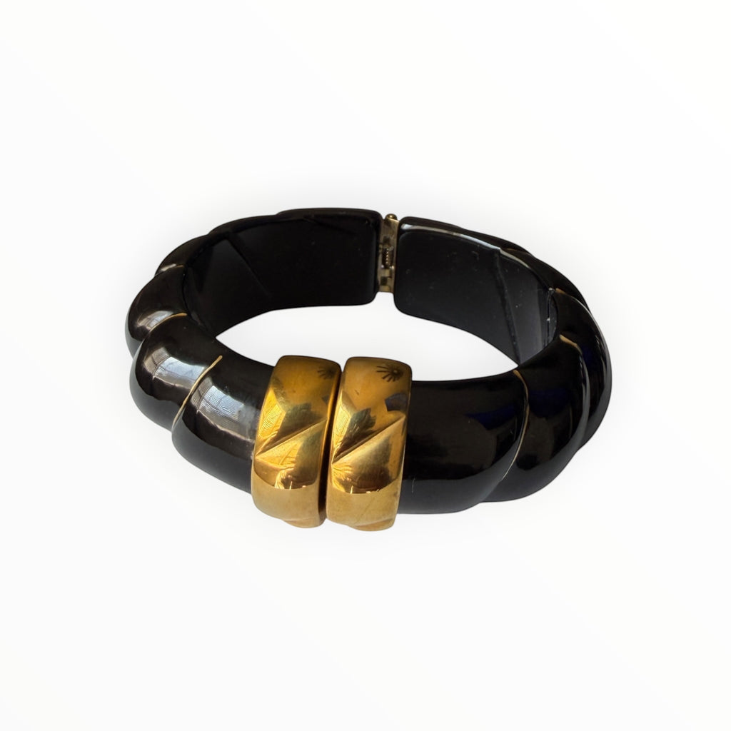 TALI The Riviera Resin Bracelet in black with gold plated accents and a chunky, ribbed design.