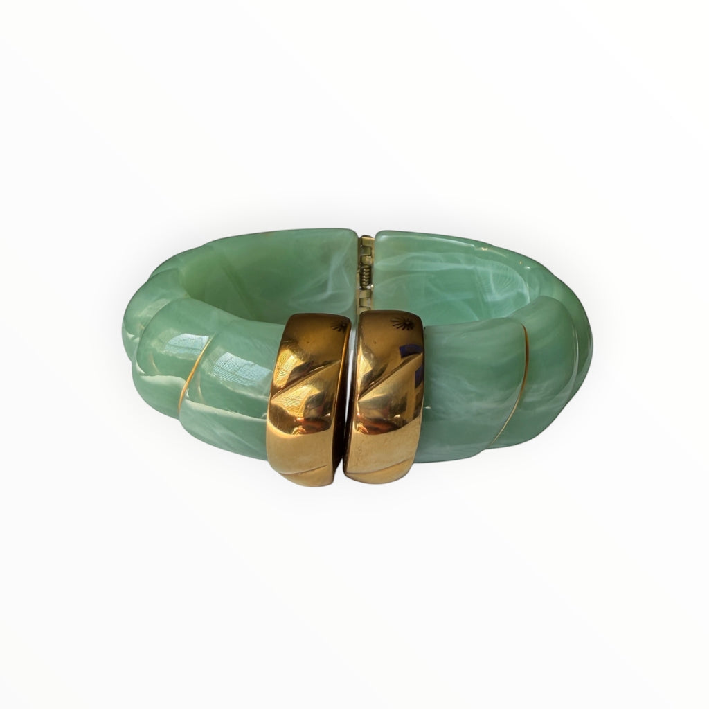 TALI The Riviera Resin Bracelet in marbled light green with gold plated accents and a hinged clasp design.