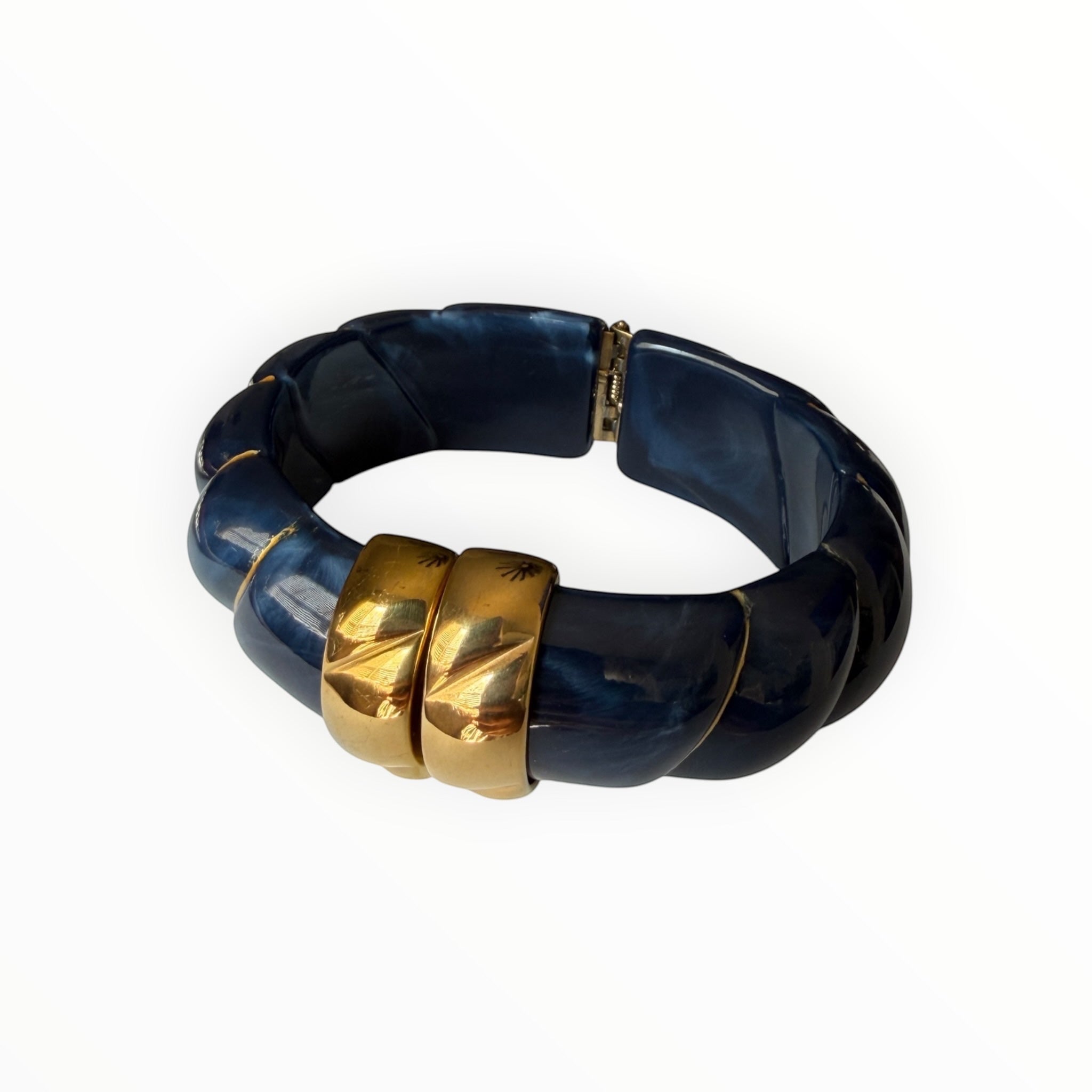 TALI The Riviera Resin Bracelet in navy blue with gold-plated accents and a chunky, textured design.