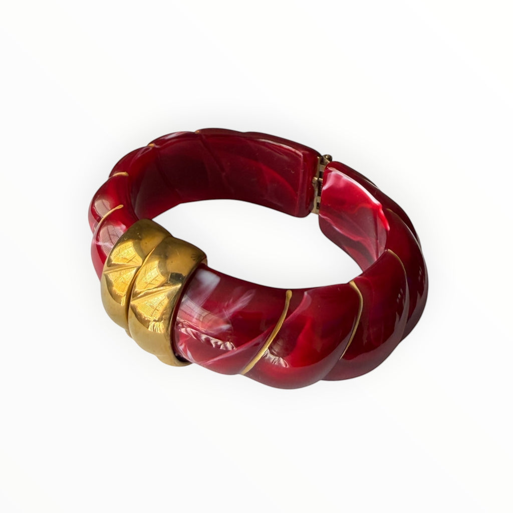 TALI The Riviera resin bracelet in deep red with gold plated accents and a textured, twisted design.