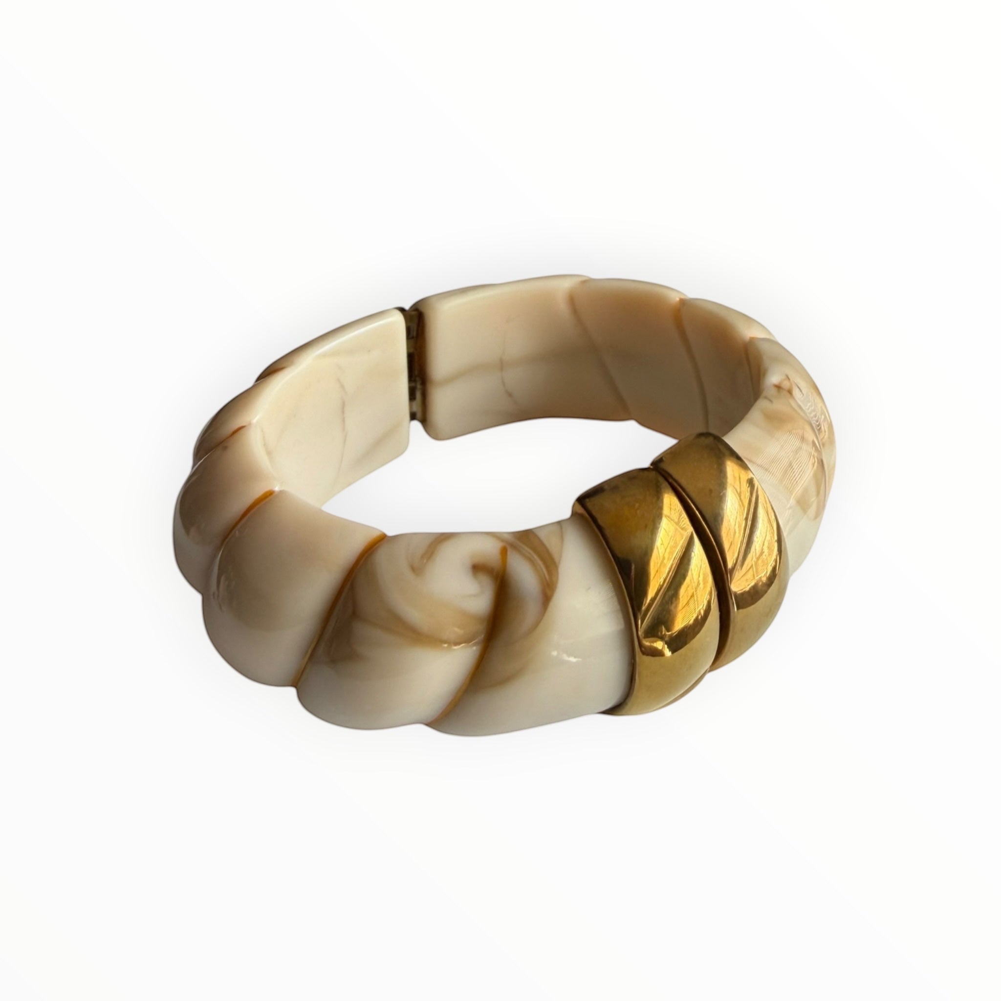 TALI The Riviera Resin Bracelet featuring cream marbled resin links accented with polished gold plated segments.
