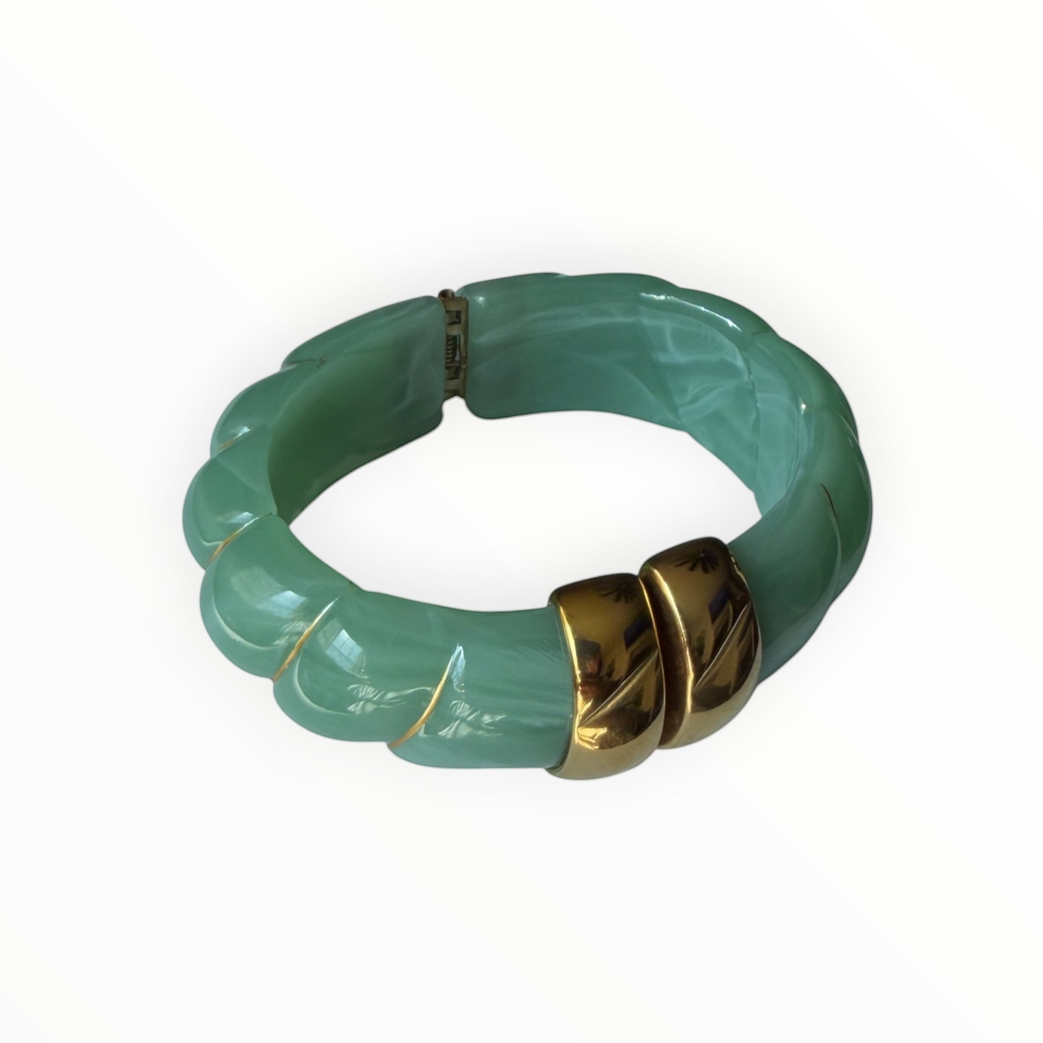 TALI The Riviera Resin Bracelet in mint green with gold-plated accents and a textured, scalloped design.