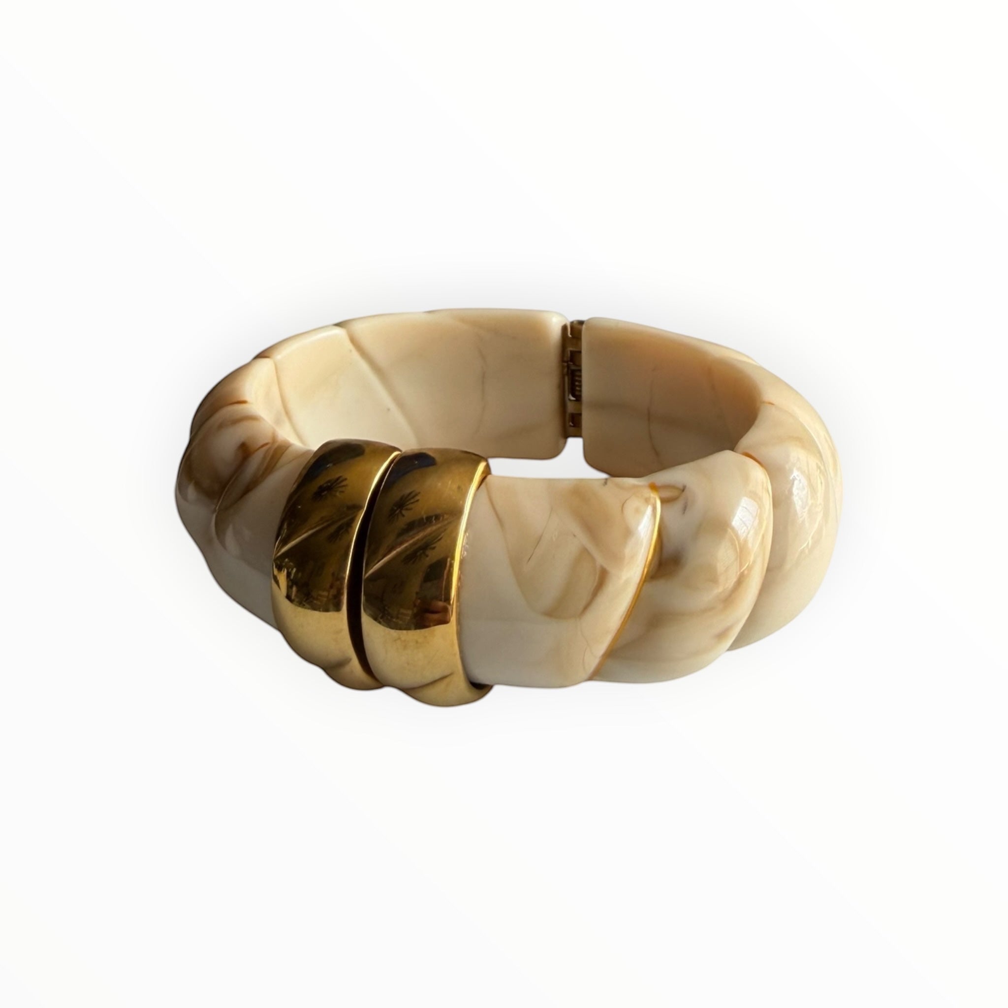 TALI The Riviera resin bracelet in cream marble with gold plated accents and a hinged design.