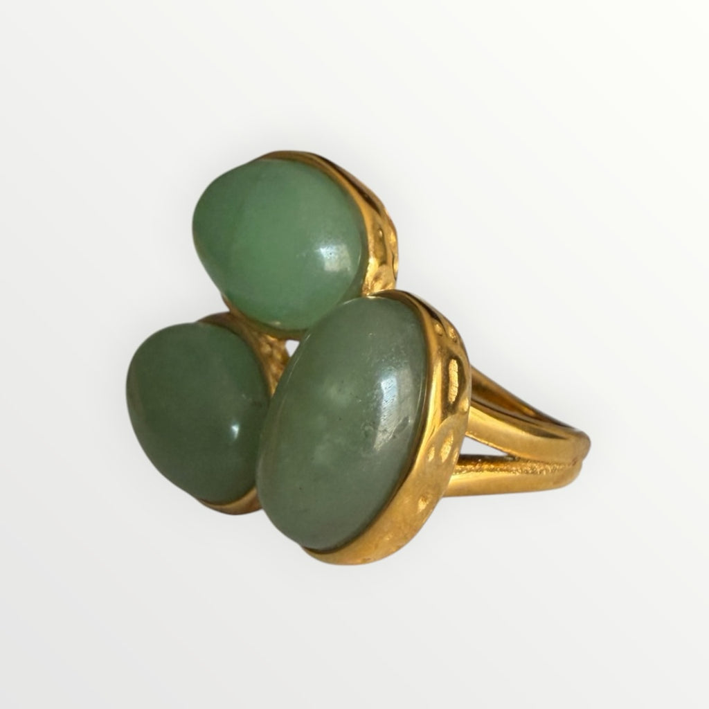 TALI triple oval green stone statement ring with a gold-toned hammered metal setting and split-shank band.