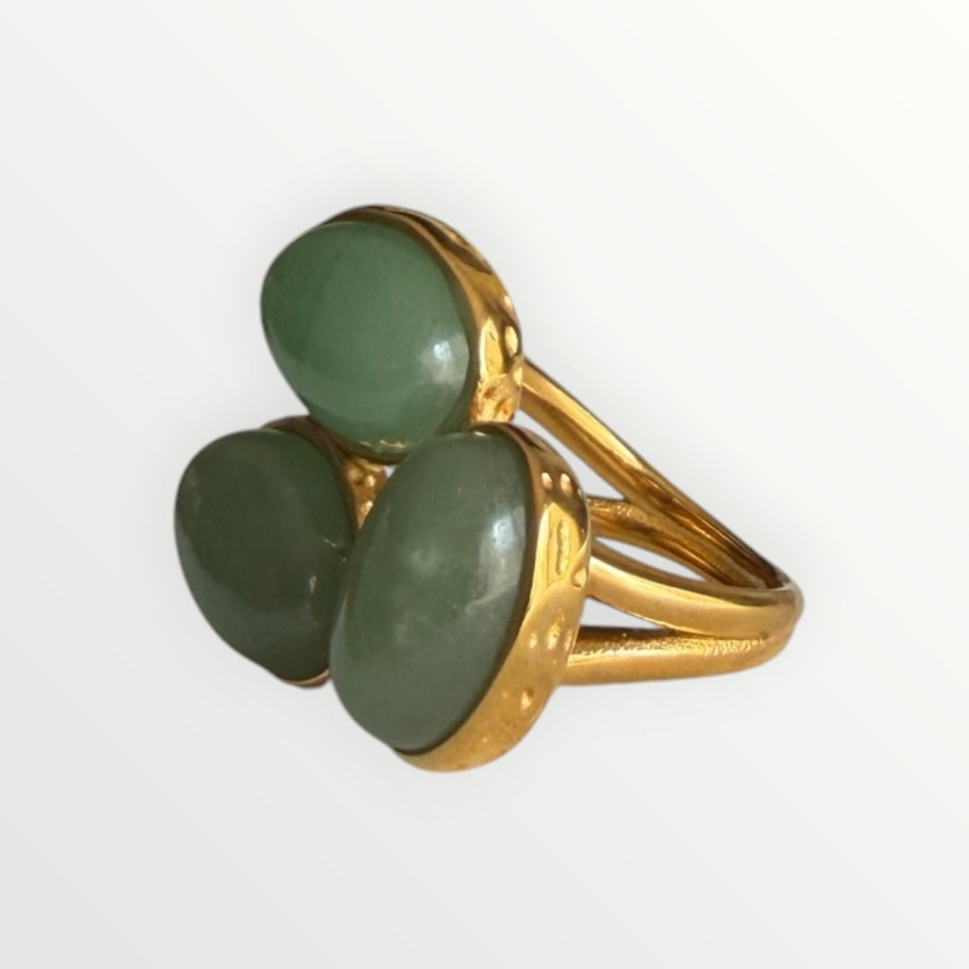 TALI triple oval green stone statement ring featuring a gold-toned hammered metal setting and a split-shank band.