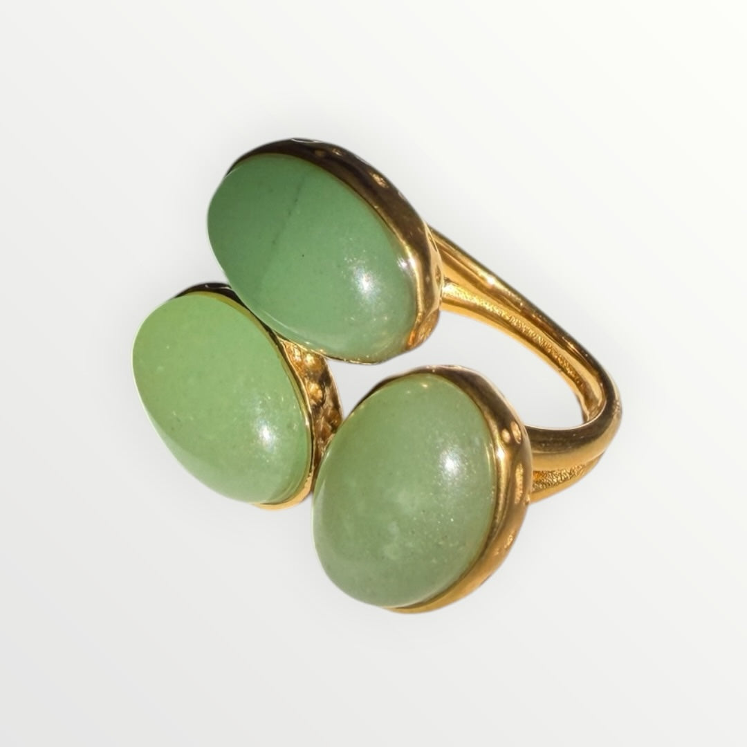 TALI triple oval green stone statement ring with a gold-toned hammered metal setting and split-shank band.
