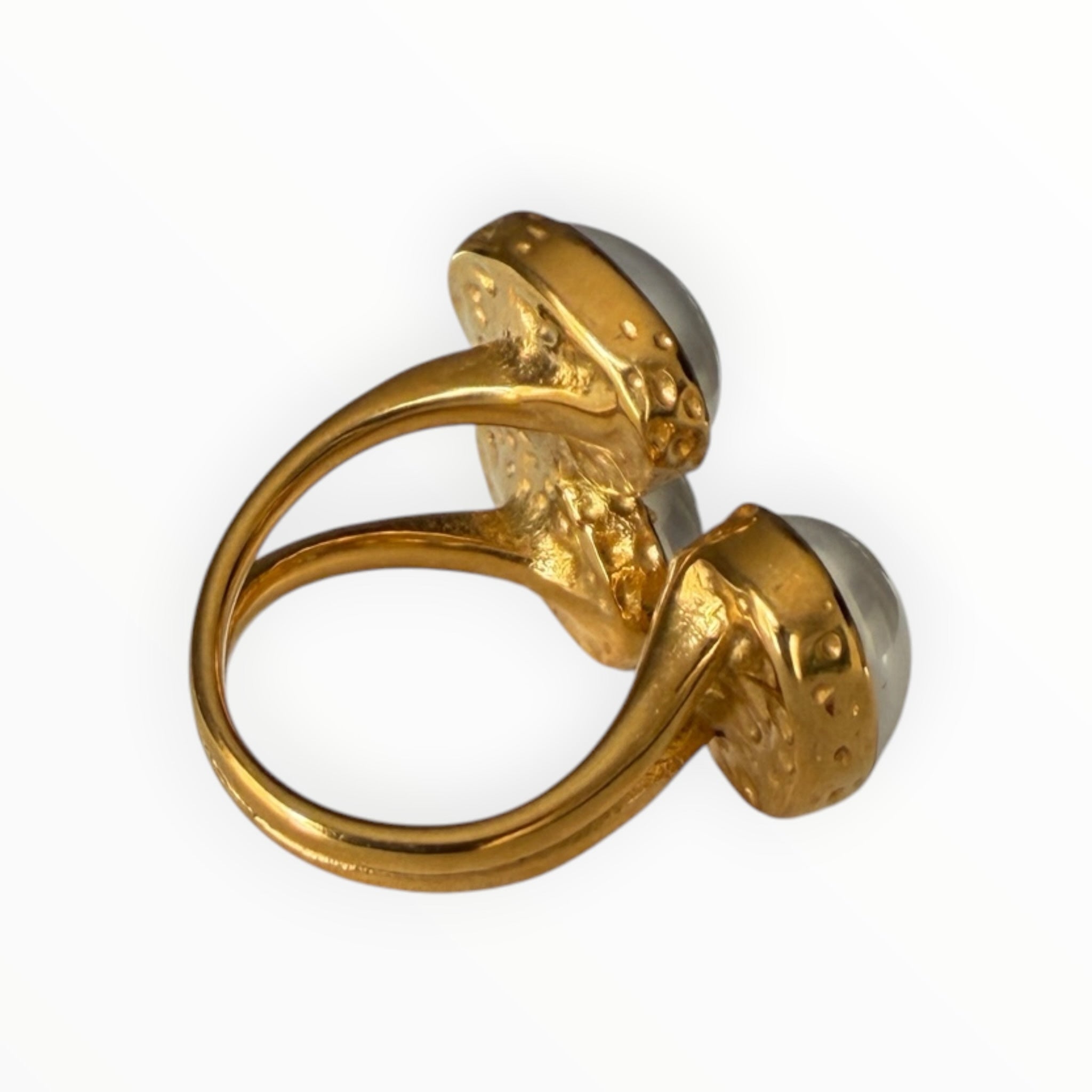TALI triple oval stone statement ring in gold-toned metal with a hammered edge and split-shank band.