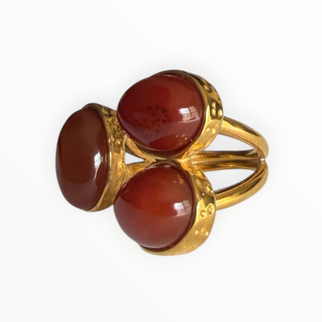 TALI triple oval cabochon stone statement ring in gold-toned metal with a hammered edge and split-shank band.