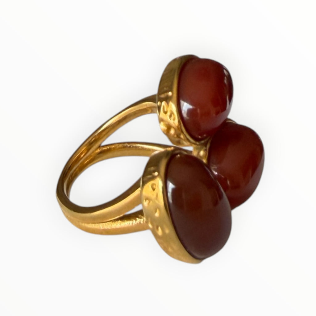TALI triple oval cabochon stone statement ring in gold-toned metal with a hammered edge and split-shank band.