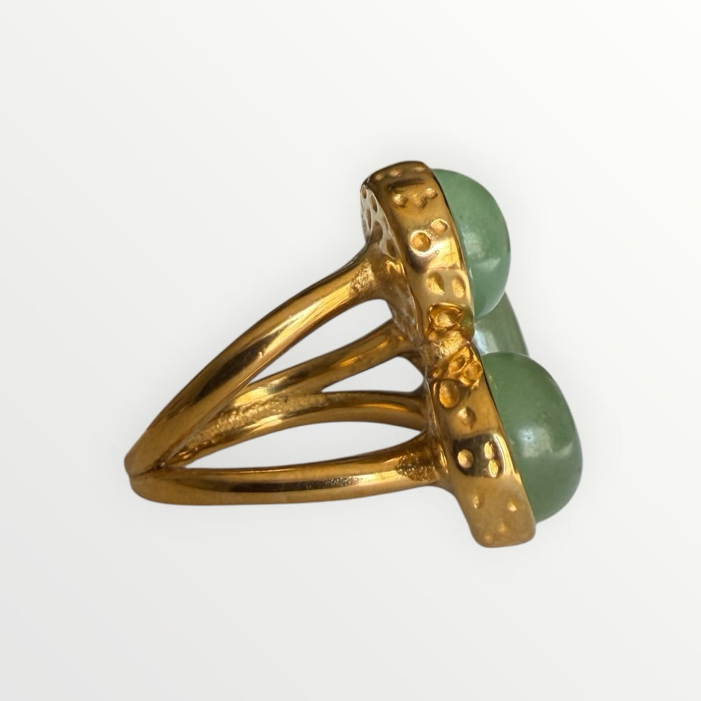 TALI triple oval green stone statement ring in gold-toned metal with a hammered edge and split-shank band side view