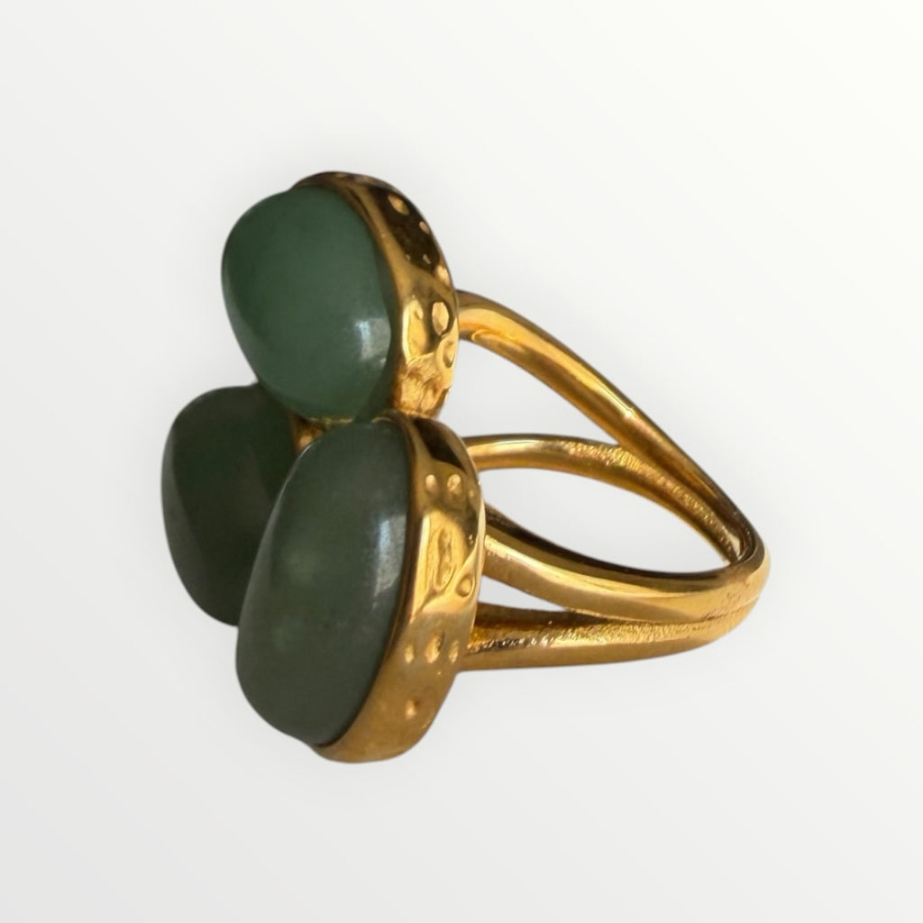 TALI triple oval green stone statement ring with a hammered gold-toned metal setting and split-shank band.