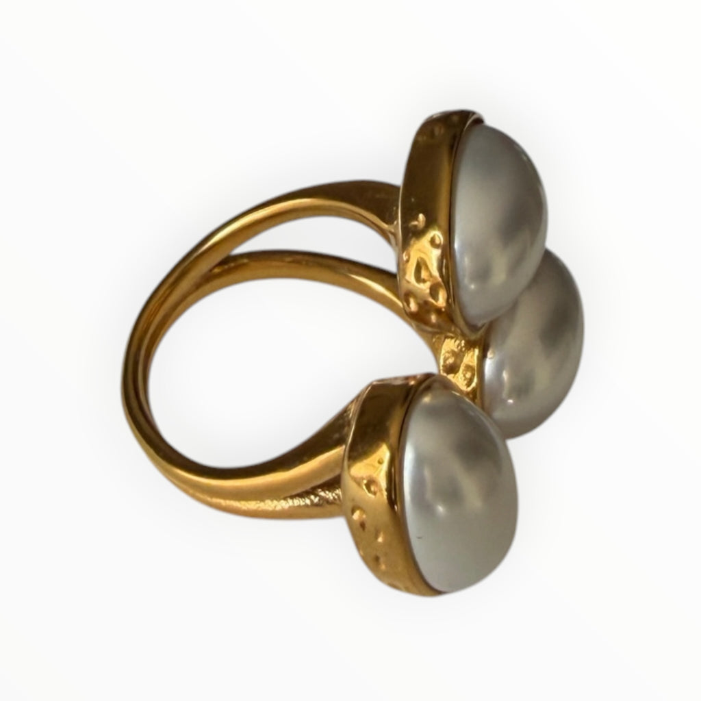 TALI triple oval stone statement ring in gold-toned metal with a hammered edge and split-shank band.