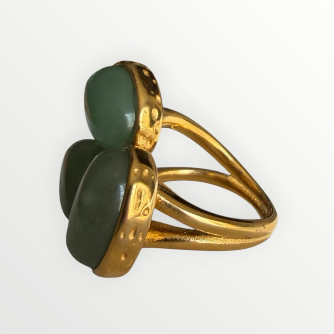 TALI triple oval green cabochon stone statement ring in gold-toned metal with a hammered edge and split-shank band.