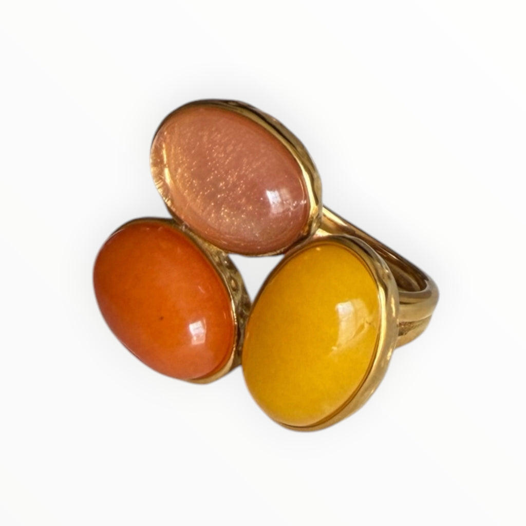 TALI triple oval stone statement ring featuring peach, orange, and yellow cabochons in a hammered gold-tone setting.